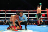 Santillan Dominates, Linares Retires